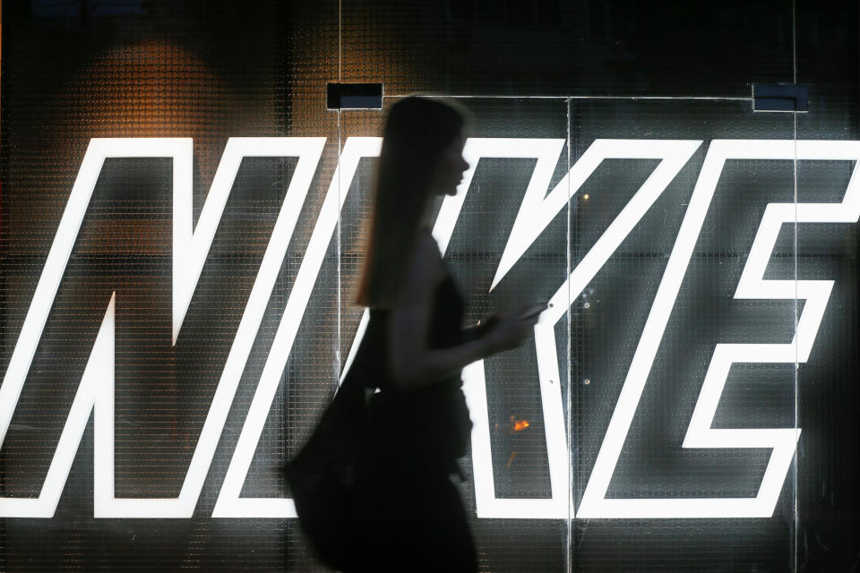 A woman walks past a Nike store in central Kiev, Ukraine August 14, 2018. Picture taken August 14, 2018.  REUTERS/Valentyn Ogirenko