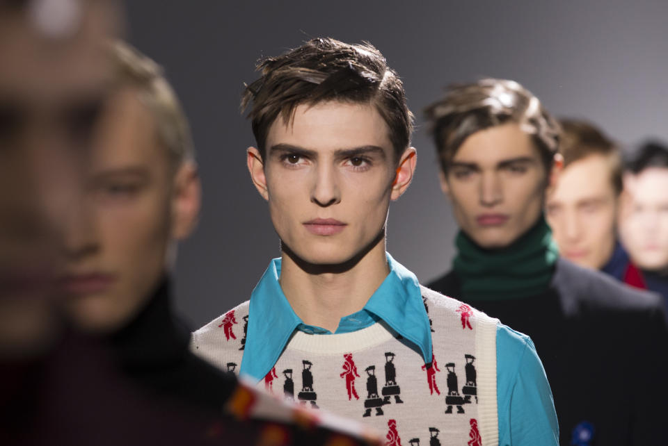 Models wear creations by Belgian fashion designer Raf Simons for their Men's Spring-Summer 2013 collection, during Paris Fashion Week, in Paris, France, Wednesday, Jan. 16 2013. (AP Photo/ Jacques Brinon)