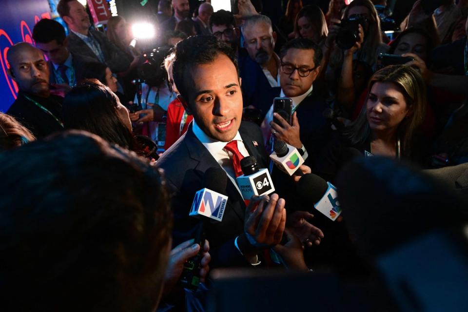 Entrepreneur Vivek Ramaswamy speaks to members of the media in the spin room following the third Republican presidential primary debate, at the Adrienne Arsht Center for the Performing Arts in Miami, Florida, on 8 November 2023 (AFP via Getty Images)