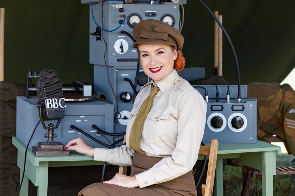 Lara Clark (46) demonstrates how ENSA performers recorded songs for wartime troops overseas.
