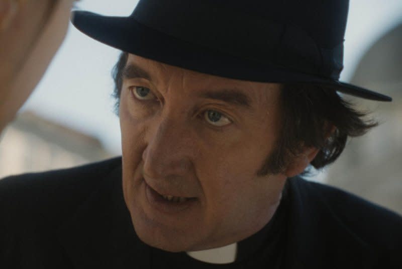 Father Brennan (Ralph Ineson) tries to warn of the antichrist. Photo courtesy of 20th Century Studios