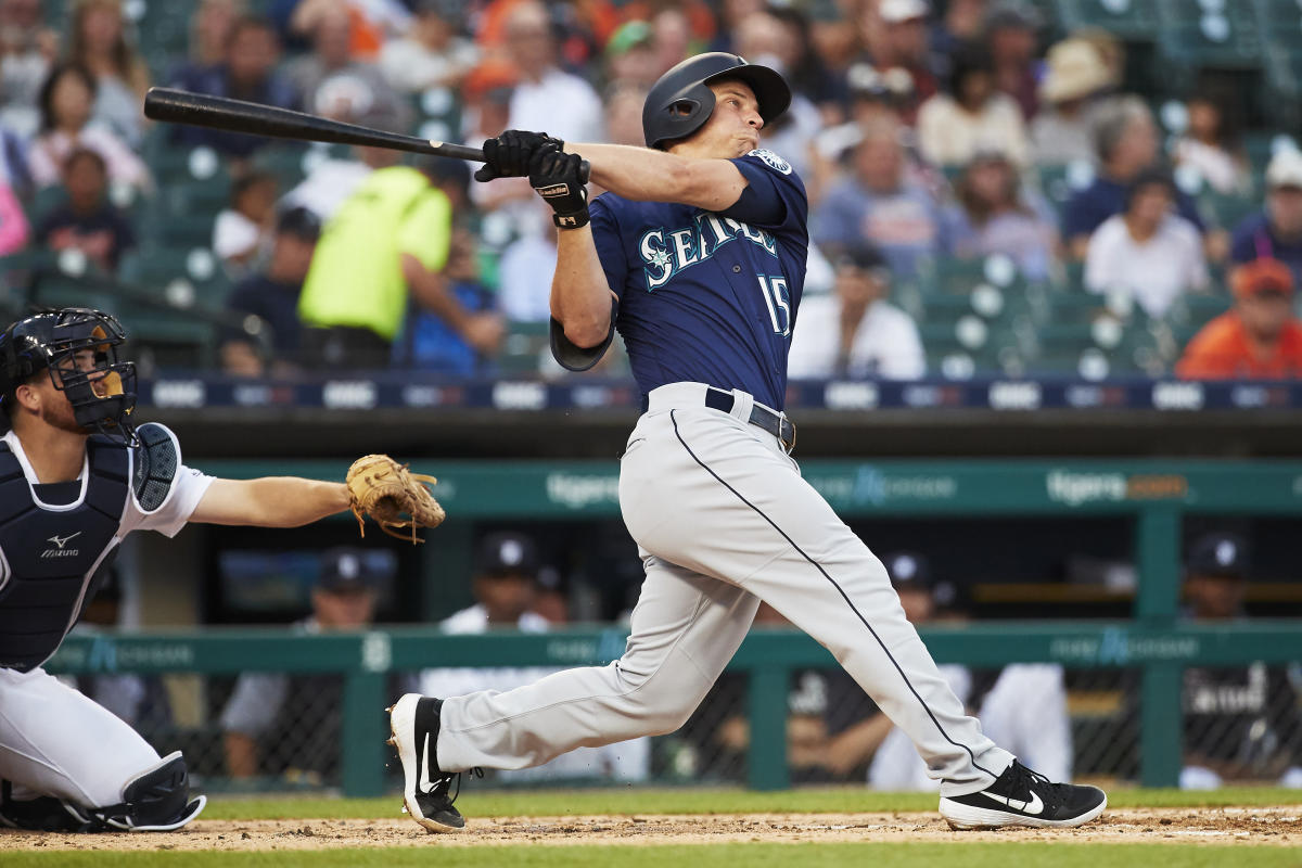 Seattle Mariners' Kyle Seager watches his three-run double against