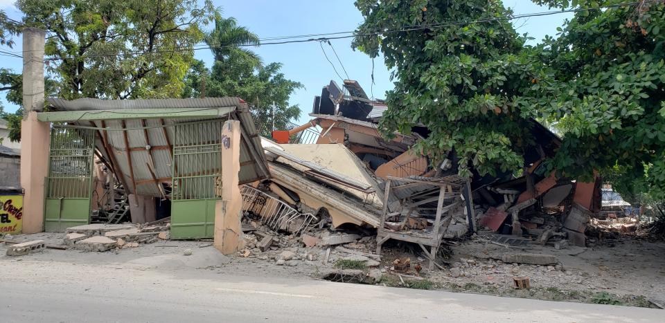 The Cayimite Hotel is damaged after an earthquake in Les Cayes, Haiti, Saturday, Aug. 14, 2021. (AP Photo/Delot Jean)