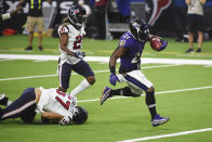 Baltimore Ravens running back Mark Ingram (21) runs for a touchdown against the Houston Texans during the second half of an NFL football game Sunday, Sept. 20, 2020, in Houston. (AP Photo/Eric Christian Smith)