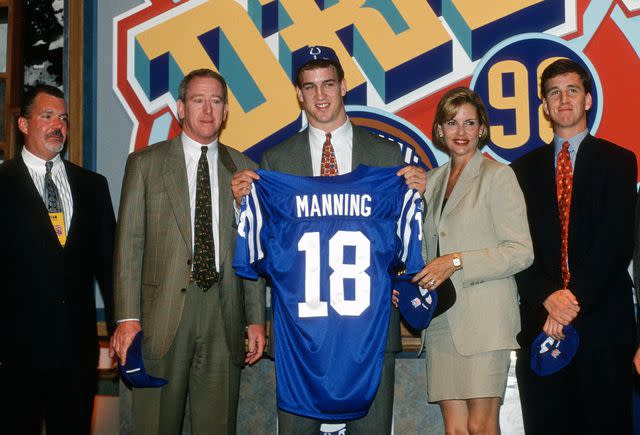 <p>Focus on Sport/Getty</p> The Manning Family in 1998