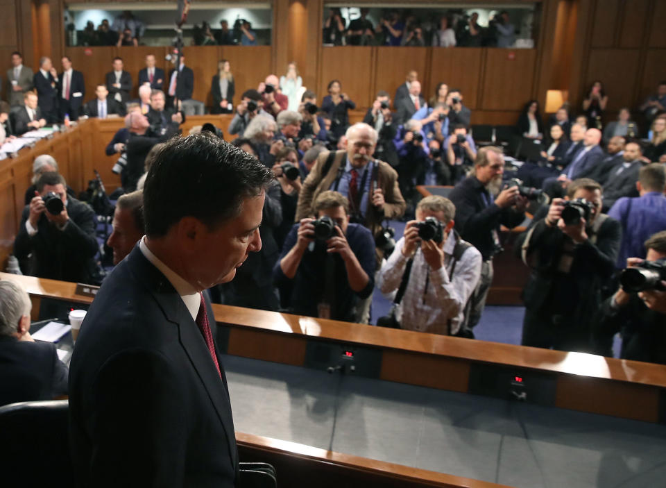 The cameras are&nbsp;snapping as Comey arrives to testify.