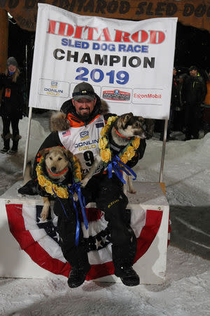 Pete Kaiser of of Bethel, Alaska poses after winning the Iditarod Trail Sled Dog Race after crossing the finish line in Nome, Alaska, U.S. March 13, 2019. REUTERS/Diana Haecker/Nome Nugget