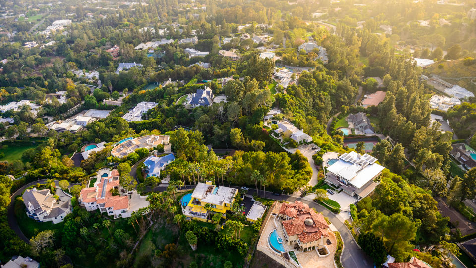 Los Angeles California - Beverly Hills landscape and mansions aerial view late afternoon.