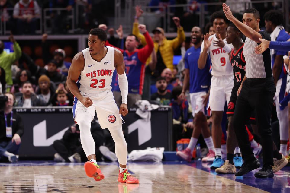 Pistons guard Jaden Ivey celebrates a 3-point basket in the second half of the Pistons' 129-127 win over the Raptors on Saturday, Dec. 30, 2023, at Little Caesars Arena, snapping the Pistons' 28-game losing streak.