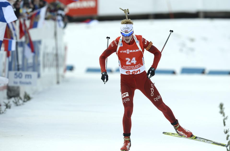 Winner Johannes Thingnes Boe of Norway skis to victory in the men's 10km sprint competition at the IBU World Cup Biathlon in Kontiolahti, Finland, Thursday March 13, 2014. (AP Photo/Heikki Saukkomaa, Leutikuva) FINLAND OUT