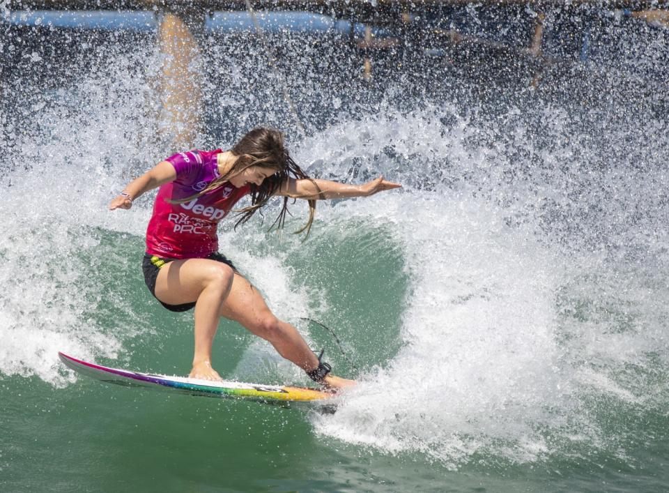 Caroline Marks, 19, of San Clemente, does a slashing turn while competing.