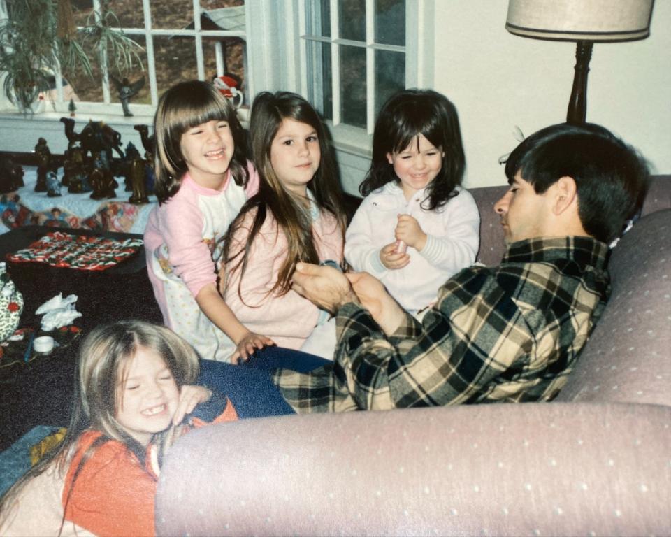 Matt Moore pictured with his four daughters on Christmas 1988.