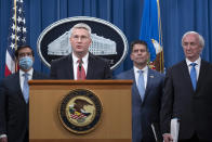 Special Agent in Charge of the Criminal and Cyber Division of the FBI's Washington Field Office James Dawson speaks, Wednesday, Sept. 16, 2020 at the Justice Department in Washington. The Justice Department has charged five Chinese citizens with hacks targeting more than 100 companies and institutions in the United States and abroad, including social media and video game companies as well as universities and telecommunications providers. Officials announced the prosecution on Wednesday. (Tasos Katopodis/Pool via AP)