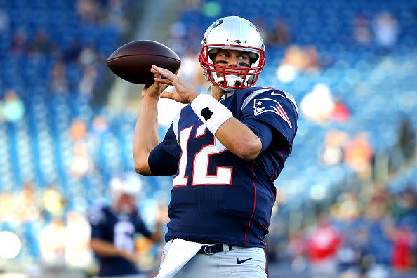 2015:  Tom Brady #12 of the New England Patriots warms up prior to a preseason game against the Green Bay Packers at Gillette Stadium on August 13, 2015 in Foxboro, Massachusetts.  (Photo by Maddie Meyer/Getty Images)