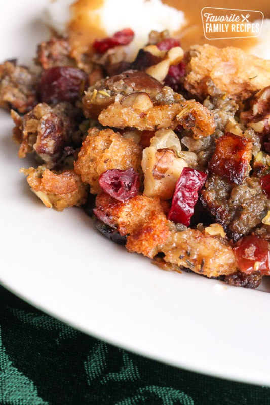 <p>Favorite Family Recipes</p><p>This Cranberry Sausage Stuffing is a sweet and savory stuffing that's always a Thanksgiving favorite.</p><p><strong>Get the recipe</strong>: <a href="https://www.favfamilyrecipes.com/cranberry-sausage-stuffing/" rel="nofollow noopener" target="_blank" data-ylk="slk:Cranberry-Sausage Stuffing;elm:context_link;itc:0;sec:content-canvas" class="link "><strong>Cranberry-Sausage Stuffing</strong></a></p>
