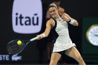 Maria Sakkari of Greece returns the ball to Elena Rybakina of Kazakhstan during the Miami Open tennis tournament, Tuesday, March 26, 2024, in Miami Gardens, Fla. (AP Photo/Marta Lavandier)