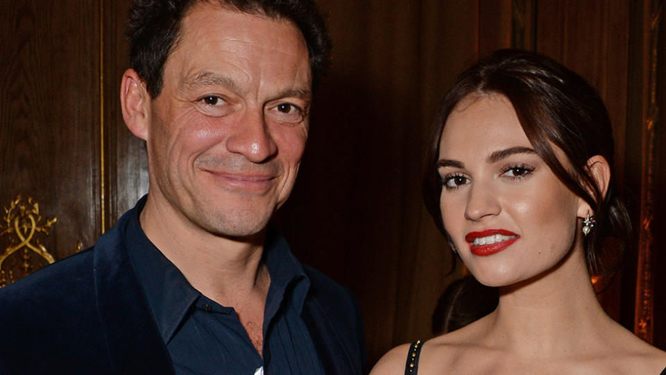 Dominic West and Lily James pose on the red carpet