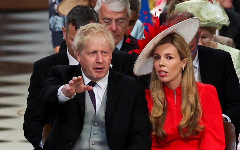 Boris Johnson and his wife Carrie Johnson attend the National Service of Thanksgiving