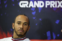 Mercedes driver Lewis Hamilton of Britain listens to questions during a media conference ahead of the Formula One Grand Prix at the Spa-Francorchamps racetrack in Spa, Belgium, Thursday, Aug. 25, 2022. The Belgian Formula One Grand Prix will take place on Sunday. (AP Photo/Olivier Matthys)