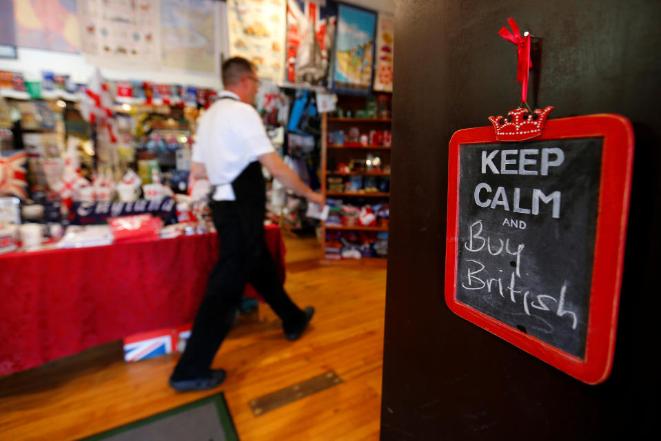 A chalkboard sign informs visitors to "Buy British" as they enter Shakespeare's Corner Shopppe, a store catering to all things British from food to tea pots, in San Diego, California, U.S. June 28, 2016.        REUTERS/Mike Blake 