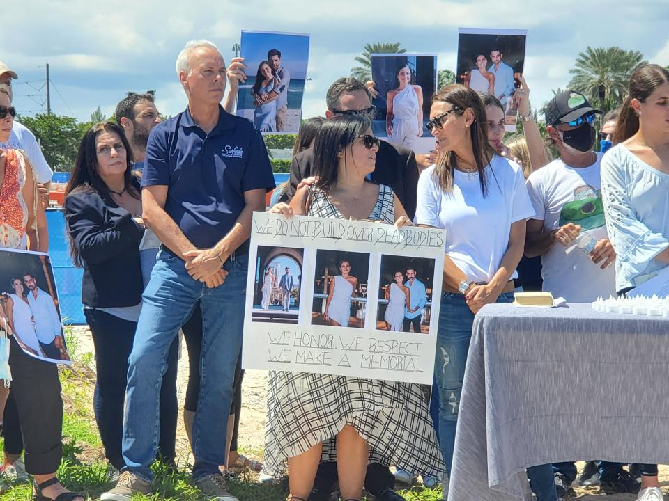 Families and friends of some of the 98 people killed in the collapse of Champlain Towers South in Surfside, Florida, hold a press conference calling for a memorial to be built at the site instead of selling to developers. Sept 23, 2021.