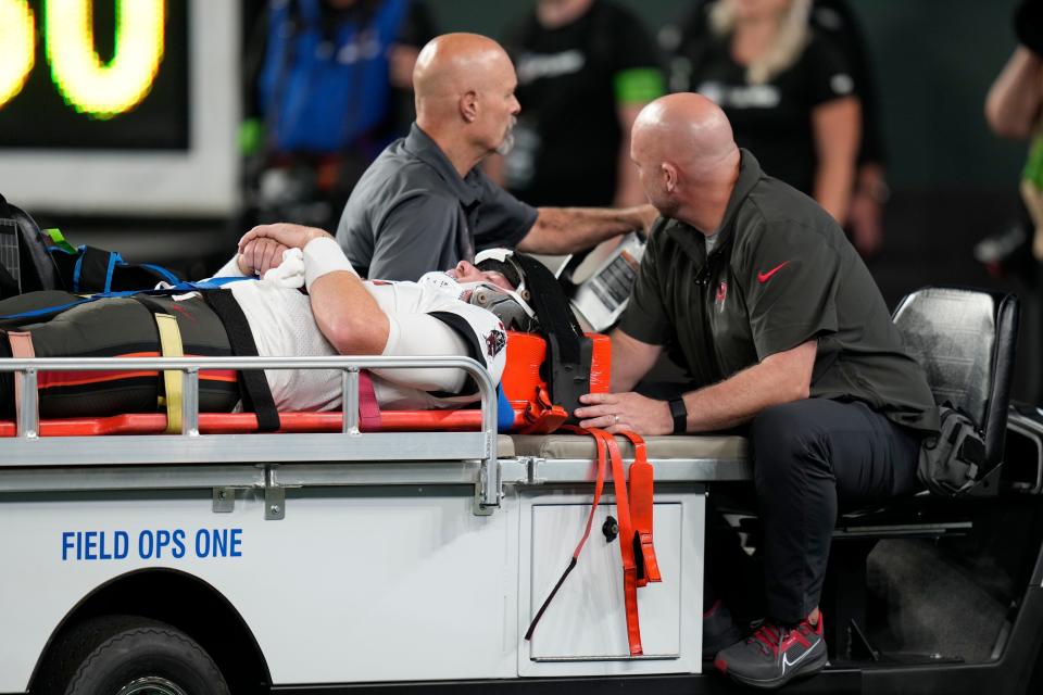 Tampa Bay Buccaneers QB John Wolford is carted off the field after suffering a neck injury.