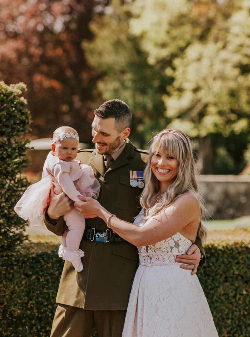 The couple with their daughter Luna at their May 2021 wedding. PA REAL LIFE – MONTANA LEE – @LAKESANDLIGHTPHOTOGRAPHY