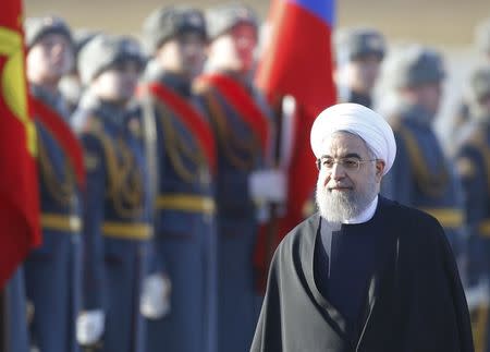 Iranian President Hassan Rouhani inspects the honour guard during a welcoming ceremony upon his arrival at Vnukovo International Airport in Moscow, Russia March 27, 2017. REUTERS/Maxim Shemetov