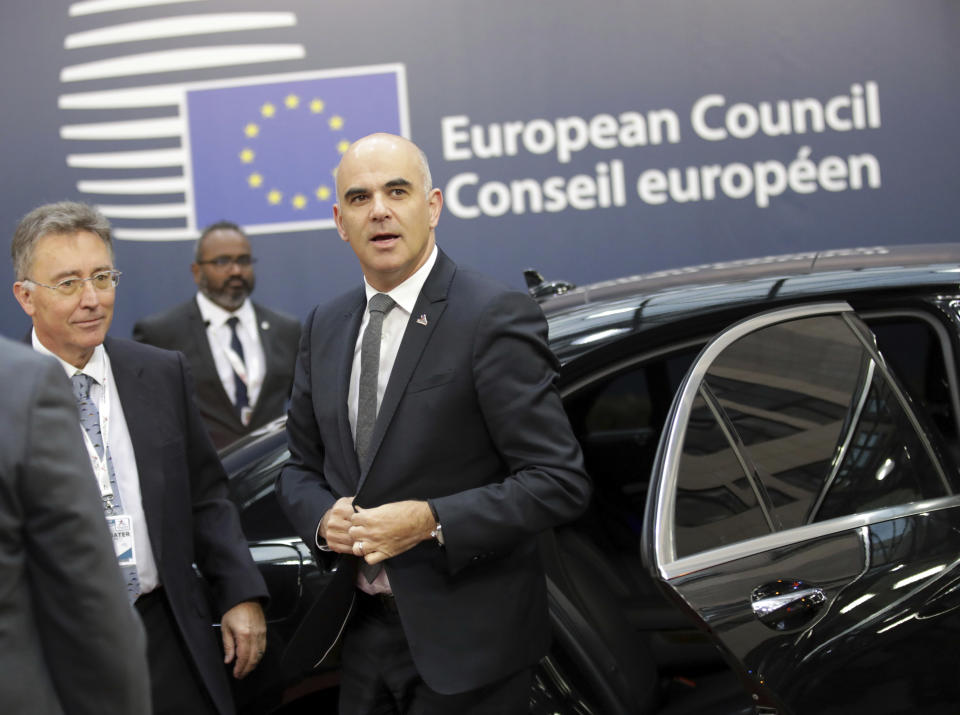 FILE - In this Friday, Oct. 19, 2018 file photo, Switzerland's President Alain Berset arrives for an EU-ASEM summit in Brussels. Britons wondering what life may be like outside the European Union might consider how the Swiss, Turks or Norwegians have fared: They know well the benefits and headaches of being close to - but not part of - the gargantuan economic and political bloc. (AP Photo/Olivier Matthys, file)