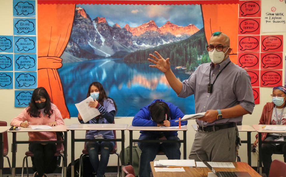 Oscar Staton teaches his students in a dual immersion English and Spanish language class at Raymond Cree Middle School in Palm Springs, Calif., May 3, 2022.