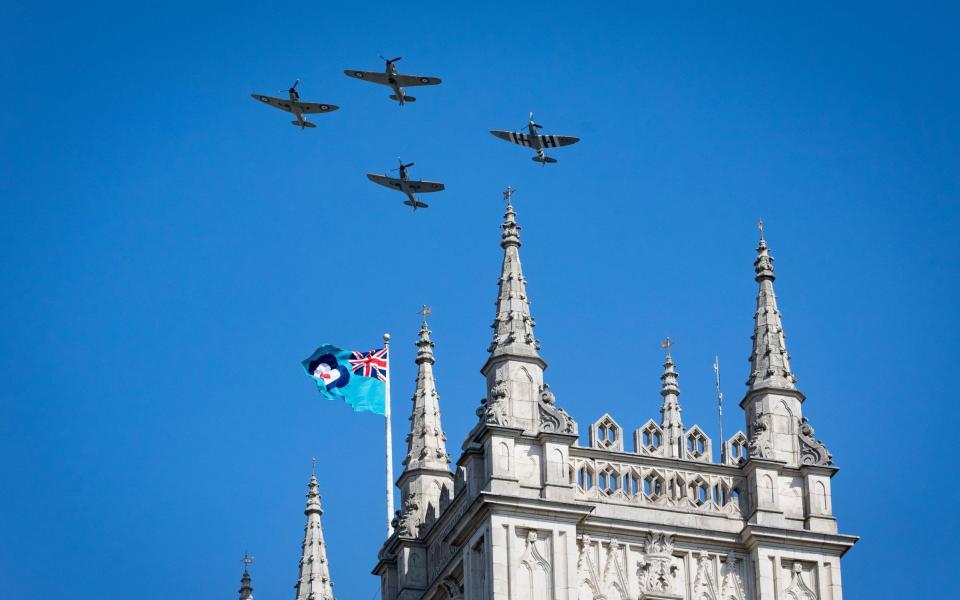 Three Spitfires and a Hurricane fly over Westminster Abbey to mark the 80th anniversary of the Battle of Britain - Aaron Chown/PA