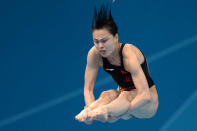 China's Wu Minxia in action during the Women's 3m Springboard Preliminary Round at the Aquatic Centre