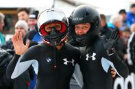 WINTERBERG, GERMANY - DECEMBER 08: (L-R) Elana Meyers and Katie Eberling of United States celebrate their second place during the two women's bob competition during the FIBT Bob & Skeleton World Cup at Bobbahn Winterberg on December 8, 2012 in Winterberg, Germany. (Photo by Christof Koepsel/Bongarts/Getty Images)