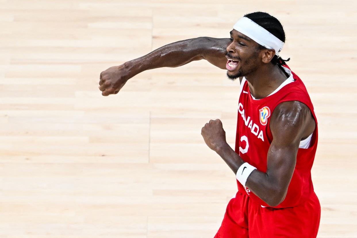 Canada's Shai Gilgeous-Alexander celebrates after beating Team USA in the third-place game at the FIBA Basketball World Cup in Manila, Philippines, on Sept. 10, 2023. (Photo by SHERWIN VARDELEON/AFP via Getty Images)