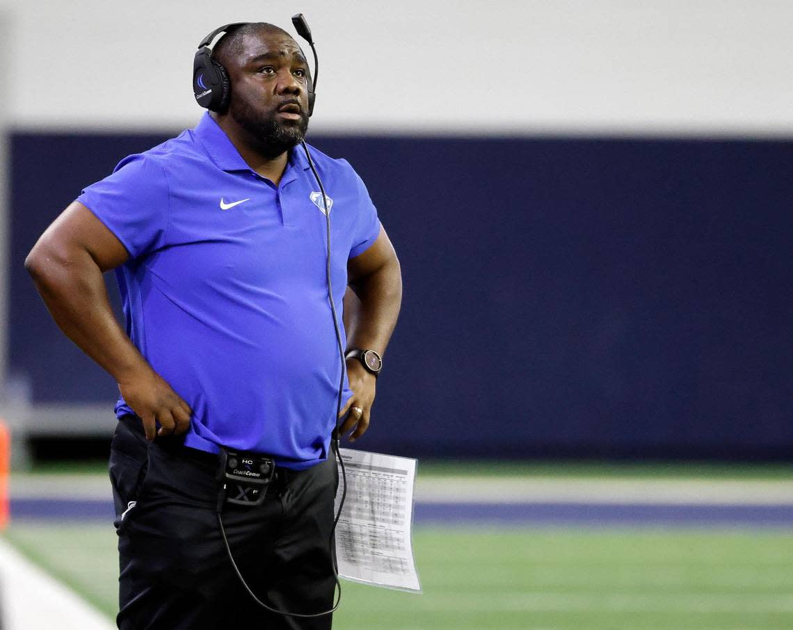 North Crowley head coach Ray Gates glances at the replay board in the first half of a UIL Class 6A Division 1 football regional-round playoff game at The Ford Center in Frisco, Texas, Saturday, Oct. 25, 2023.