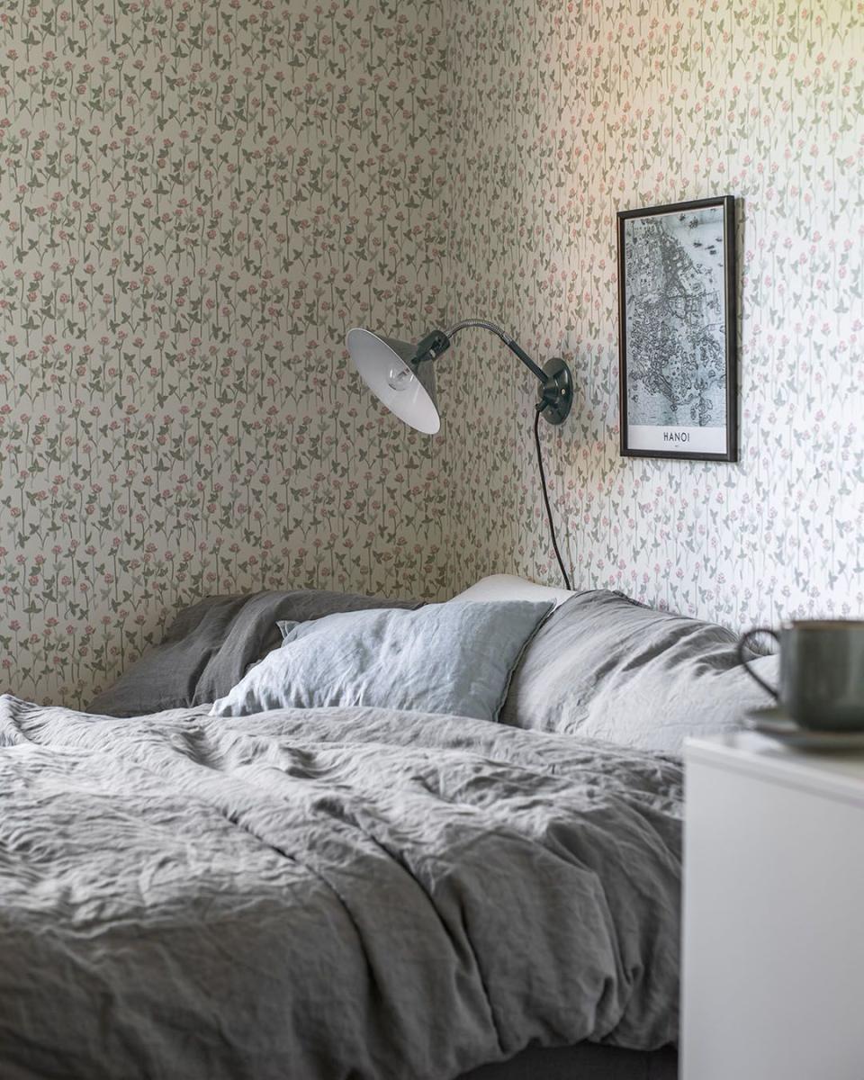 Wallpaper all your bedroom walls for a cozy feel