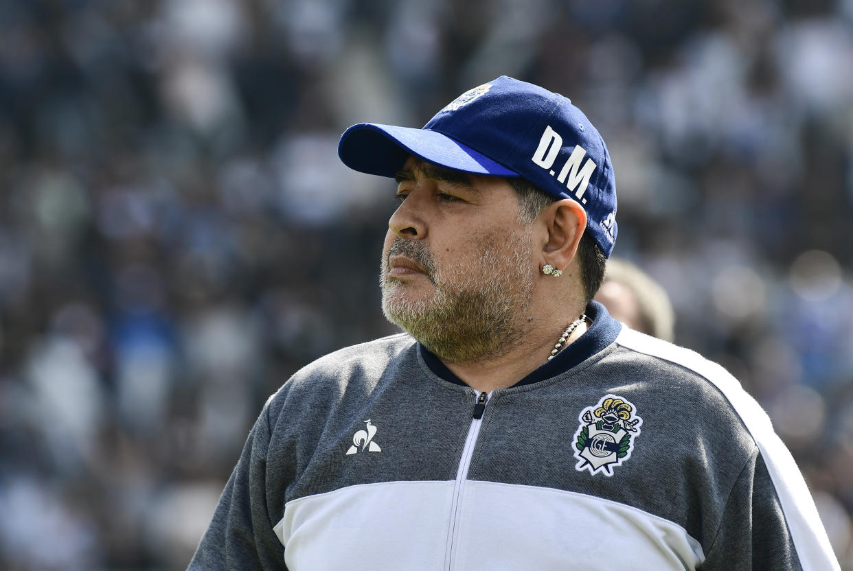 Diego Maradona, head coach of the Gimnasia y Esgrima La Plata, looks on prior to a local tournament soccer match against Racing Club at Juan Carmelo Zerillo stadium in La Plata, Argentina, Sunday, Sept. 15, 2019. (AP Photo/Gustavo Garello)