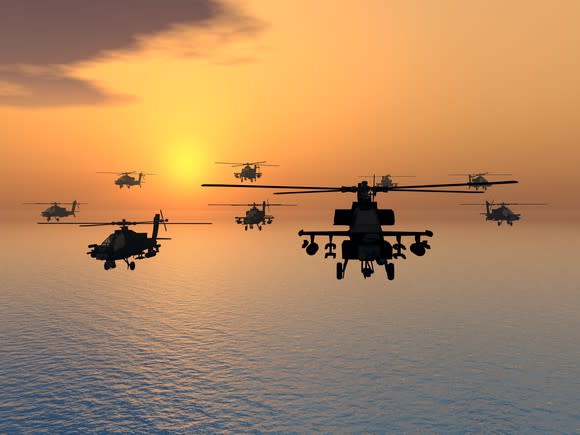 Military helicopters in flight.