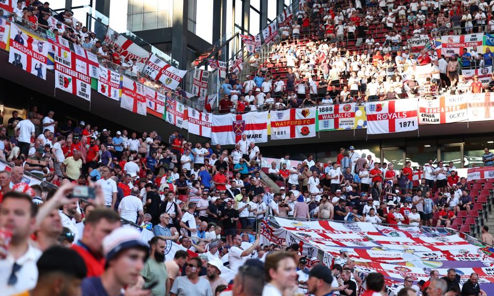 <span>England fans show their dismay after descending on Cologne for the Slovenia showdown.</span><span>Photograph: Robbie Jay Barratt/AMA/Getty Images</span>