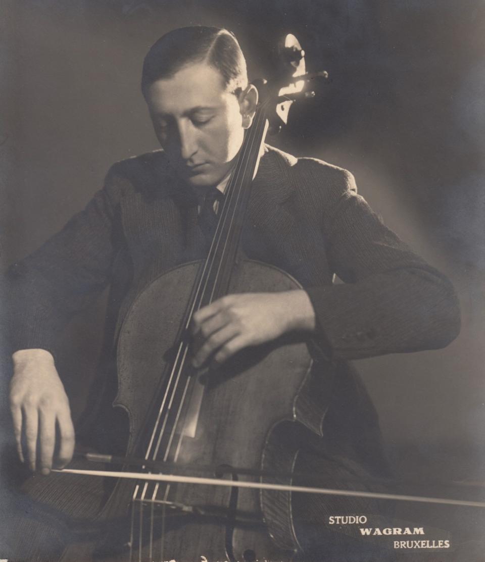 A monochrome image of the cellist at work