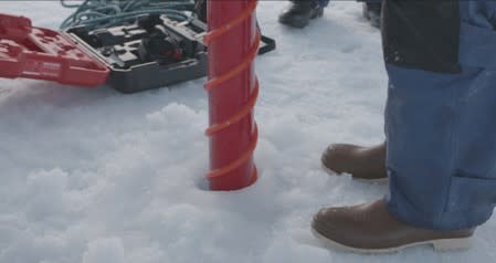 An ice core is drilled in the Canadian Arctic during the U.S.-led Northwest Passage Project, during an 18-day icebreaker expedition that took place in July and August 2019