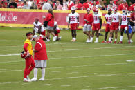 Kansas City Chiefs quarterback Patrick Mahomes stands next to head coach Andy Reid as the team runs drills during an NFL football training camp Saturday, July 31, 2021, in St. Joseph, Mo. (AP Photo/Ed Zurga)