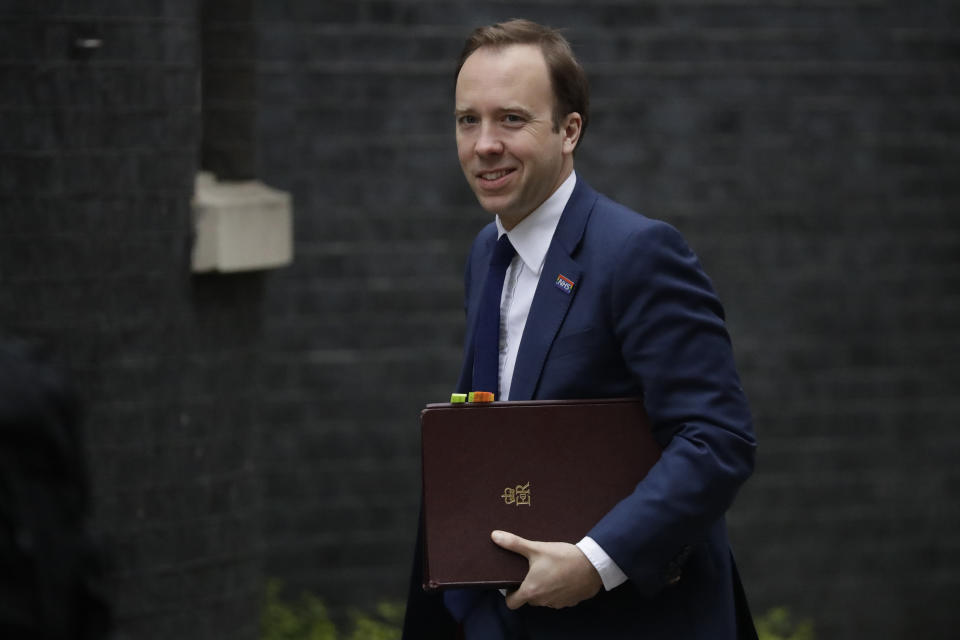 Britain's Health Secretary Matt Hancock arrives for a cabinet meeting in 10 Downing Street, London, Tuesday, April 2, 2019. British Prime Minister Theresa May is set for a marathon session with her Cabinet as the government tries to find a way out of the Brexit crisis, after lawmakers again rejected all alternatives to her European Union withdrawal agreement. (AP Photo/Matt Dunham)