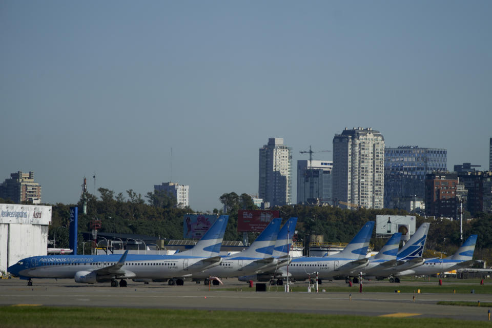 Planes sit idle at Jorge Newbery International Airport during a general strike against the reforms of President Javier Milei in Buenos Aires, Argentina, Thursday, May 9, 2024. (AP Photo/Natacha Pisarenko)