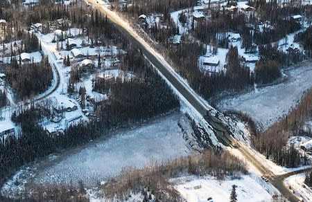 A damaged road is seen during a survey by the Alaska National Guard 176th Wing after an earthquake near Anchorage, Alaska, U.S. November 30, 2018. U.S. Air National Guard/Handout via REUTERS