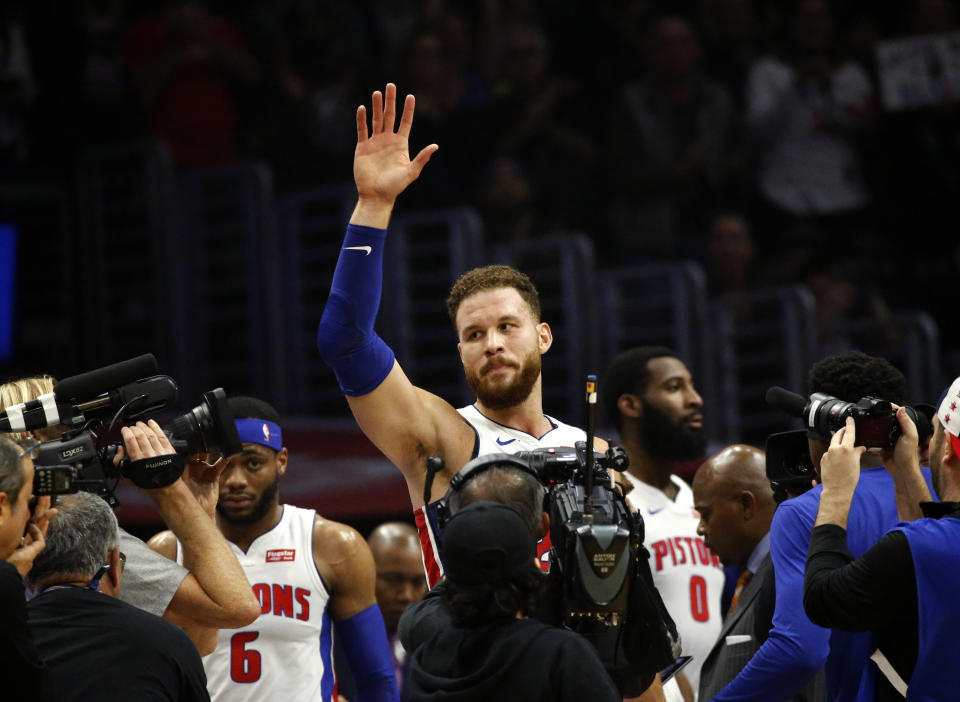 Detroit’s Blake Griffin waves to fans during the first half against the Clippers in Los Angeles on Saturday. (AP)