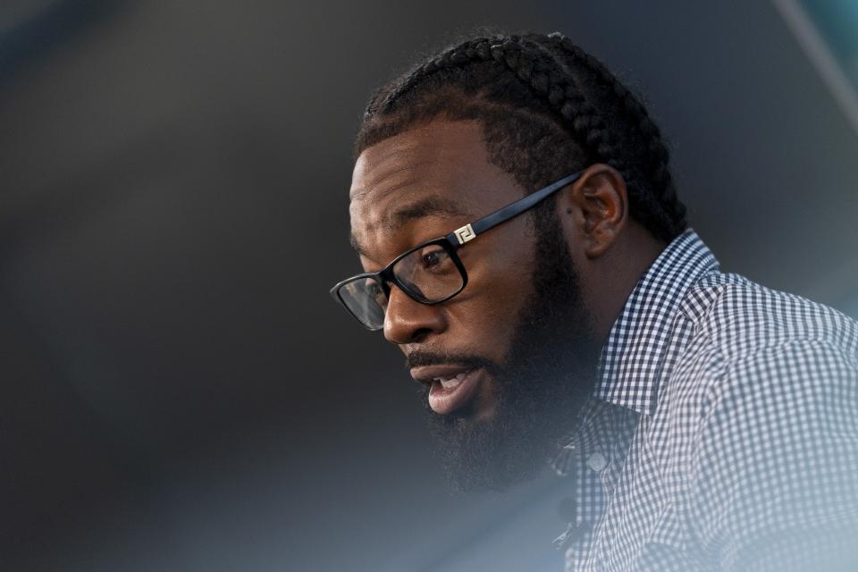 Shiloh Jordan, a Baltimore native whose cannabis conviction was pardoned by an executive order from Maryland Gov. Wes Moore on Monday, speaks to the Associated Press during an interview, Tuesday, June 18, 2024, in Baltimore. (AP Photo/Stephanie Scarbrough)