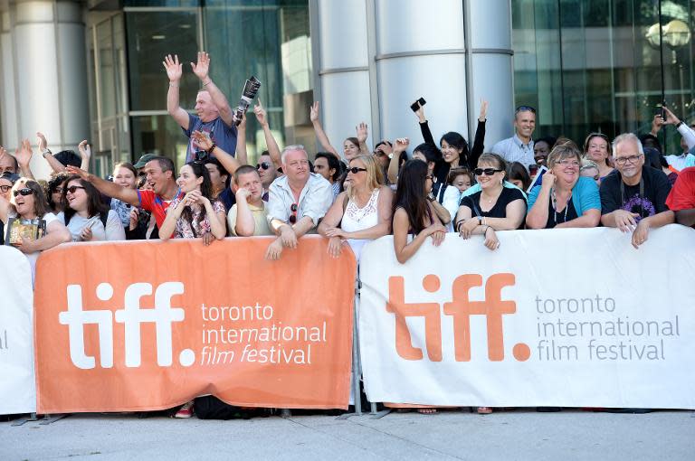 Movie fans gather before 'The Judge' gala premiere during the Toronto International Film Festival, at Roy Thomson Hall, on September 4, 2014