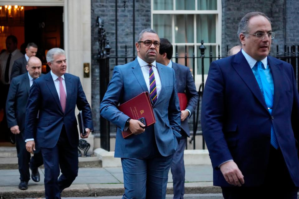 James Cleverly, centre, leaving a cabinet meeting at Downing Street (Associated Press)