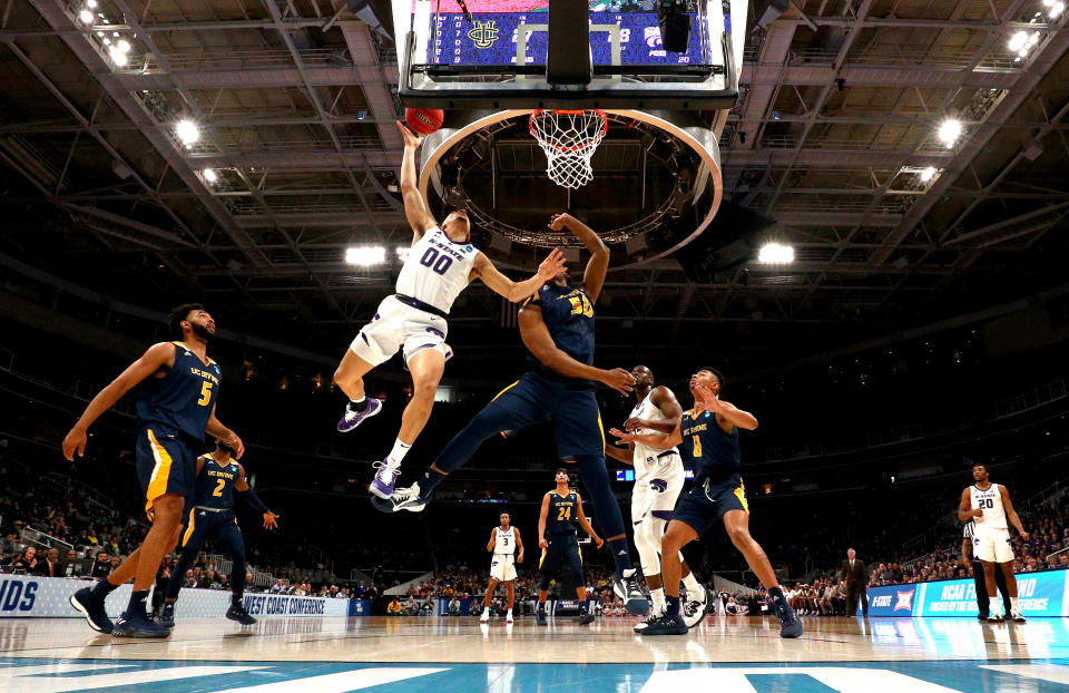 <p>Mike McGuirl #0 of the Kansas State Wildcats takes a shot against Elston Jones #50 of the UC Irvine Anteaters in the first half during the first round of the 2019 NCAA Men’s Basketball Tournament at SAP Center on March 22, 2019 in San Jose, California. (Photo by Ezra Shaw/Getty Images) </p>